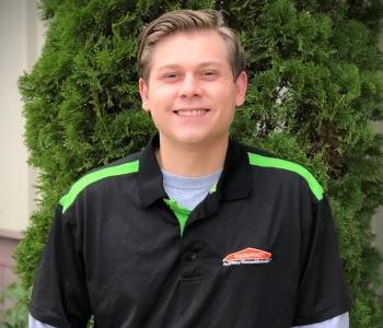Male with brown hair and SERVPRO shirt